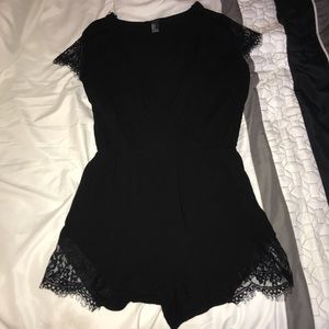 Black deep plunge romper